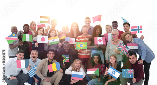 Large group of people with flags isolated over white background photo