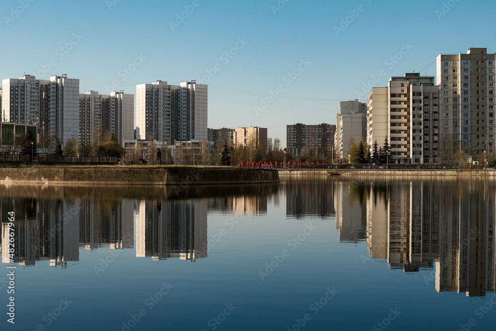 View of the city from the shore of the pond