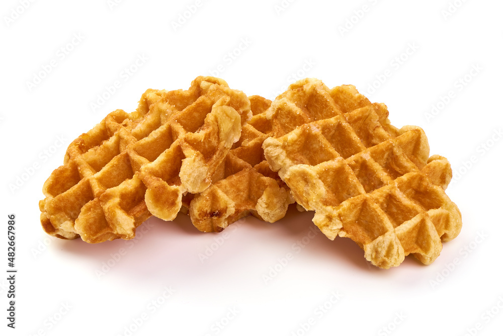 Freshly baked belgium waffles, isolated on white background. Freshly baked belgium waffles, isolated on white background.