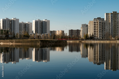 View of the city from the shore of the pond