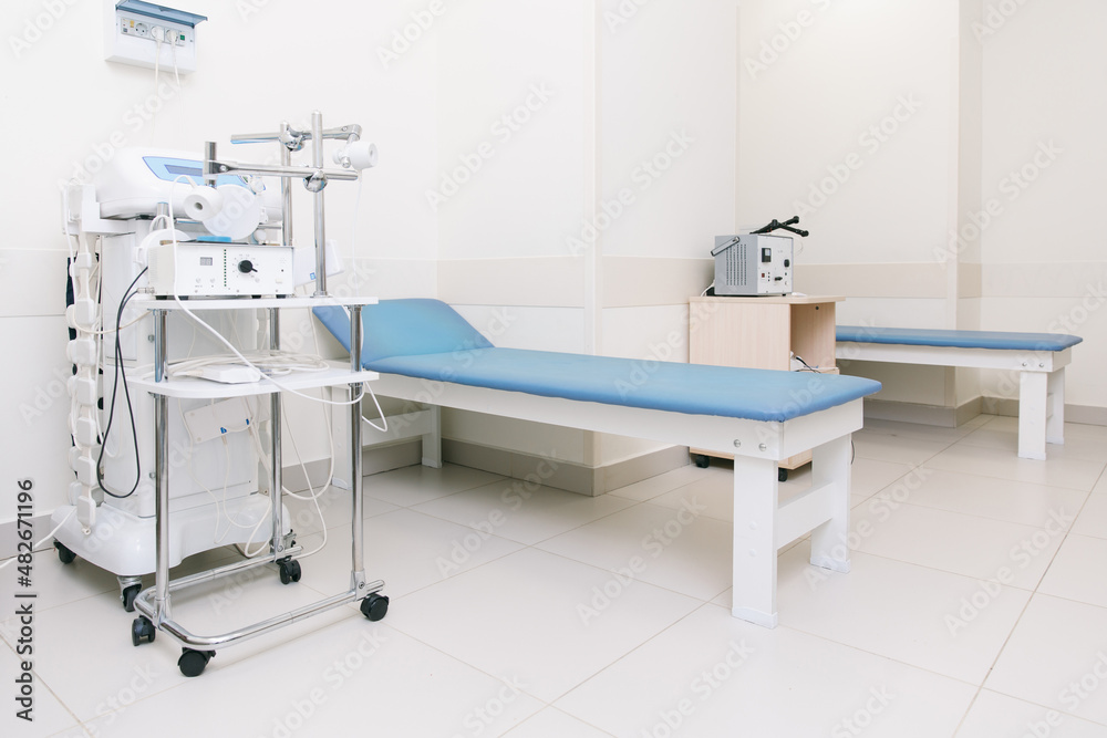 Hospital diagnostic room. Modern medical equipment, preventional medicine and healthcare concept. Modern hospital laboratory. Treatment room. Physiotherapy. Doctor office interior