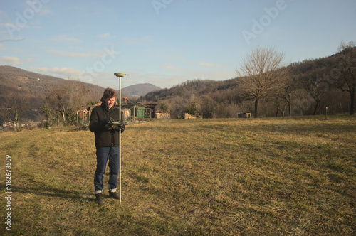 surveyor engineer measuring with GPS