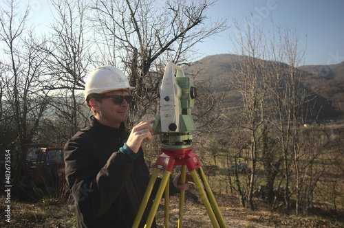 surveyor engineer measuring the world