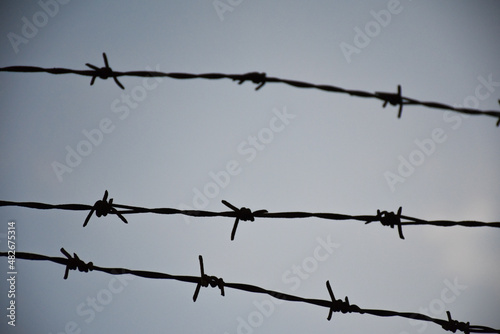 barbed wire on the wall. close-up barbed wire.