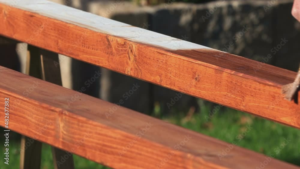 painting wood with a brush
painting wood with a brush
