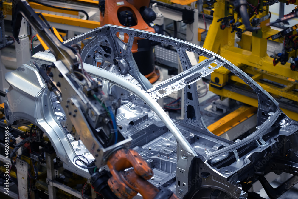 Fototapeta premium Car manufacturing plant, robotic welding line