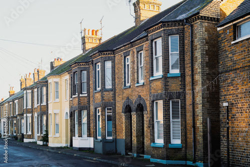 A row of red brick terrace houses in Kent, UK.