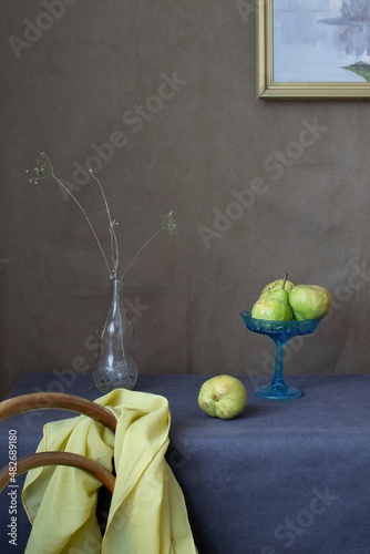 Still life with pears on the table. Home, office decoration