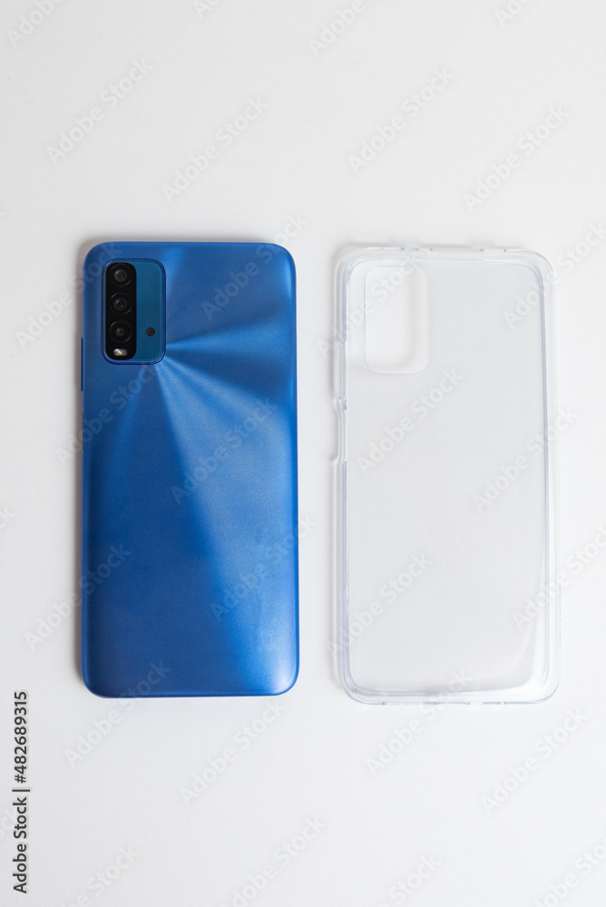 New cellphone with transparent cover over isolated white background New cellphone with transparent cover over isolated white background