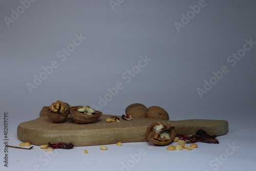 walnuts, walnuts on the board, peas, peas and nuts © Anna