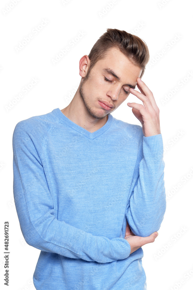 Portrait of handsome tired man posing on white background Portrait of handsome tired man posing on white background