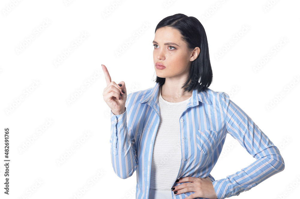 Portrait of beautiful woman pointing isolated on white background Portrait of beautiful woman pointing isolated on white background
