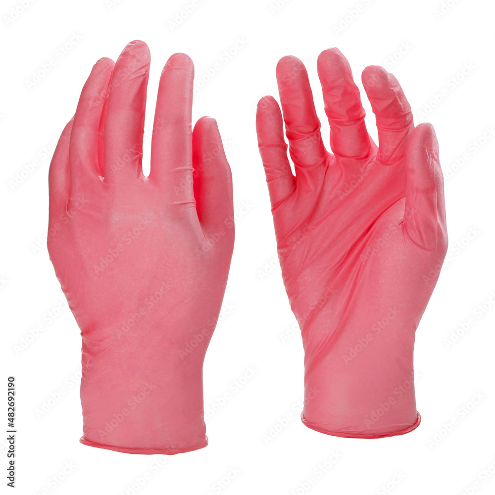 Two pink latex medical gloves isolated on white background with no hands Two pink latex medical gloves isolated on white background with no hands