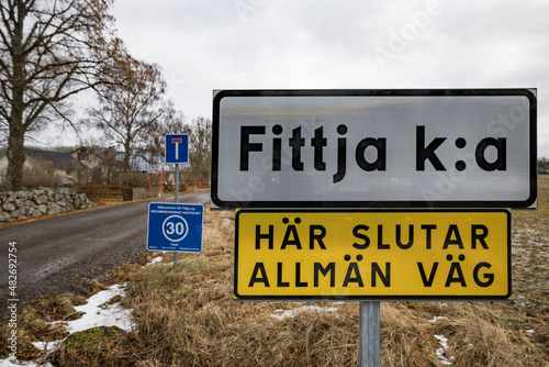 Fittja, Sweden A road sign says in Swedish "Fittja Church, end of the road." © Alexander