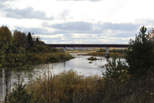 autumn colors on the water surface of the river