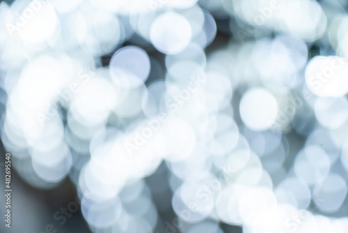 Elegant and romantic white Christmas lights background with bokeh
