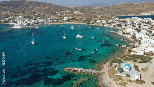 Aerial drone photo of picturesque Pollonia a quiet, family -friendly village on the north-east corner of Milos island, Cyclades, Greece photo