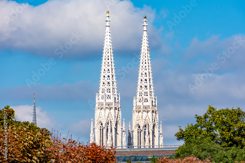 Photography Towers of Votivkirche church in autumn, Vienna, Austria