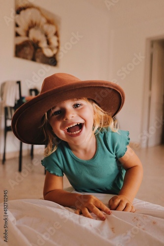 little child in cowboy hat