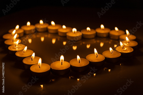 Heart made from burning candles