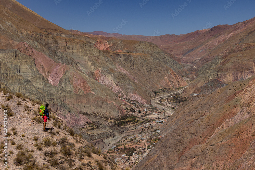 Person contemplating the landscape of mountains in northern Argentina