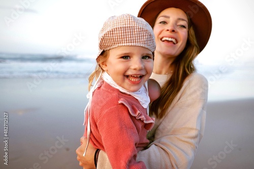mother and daughter at the beach in portugal algarve