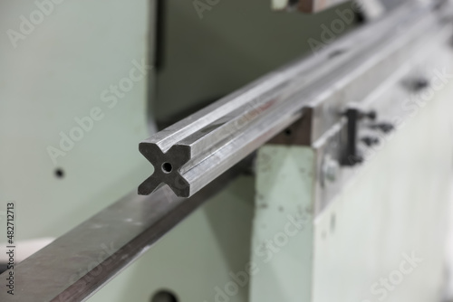 Close up shot of bending tool in side metal working machine