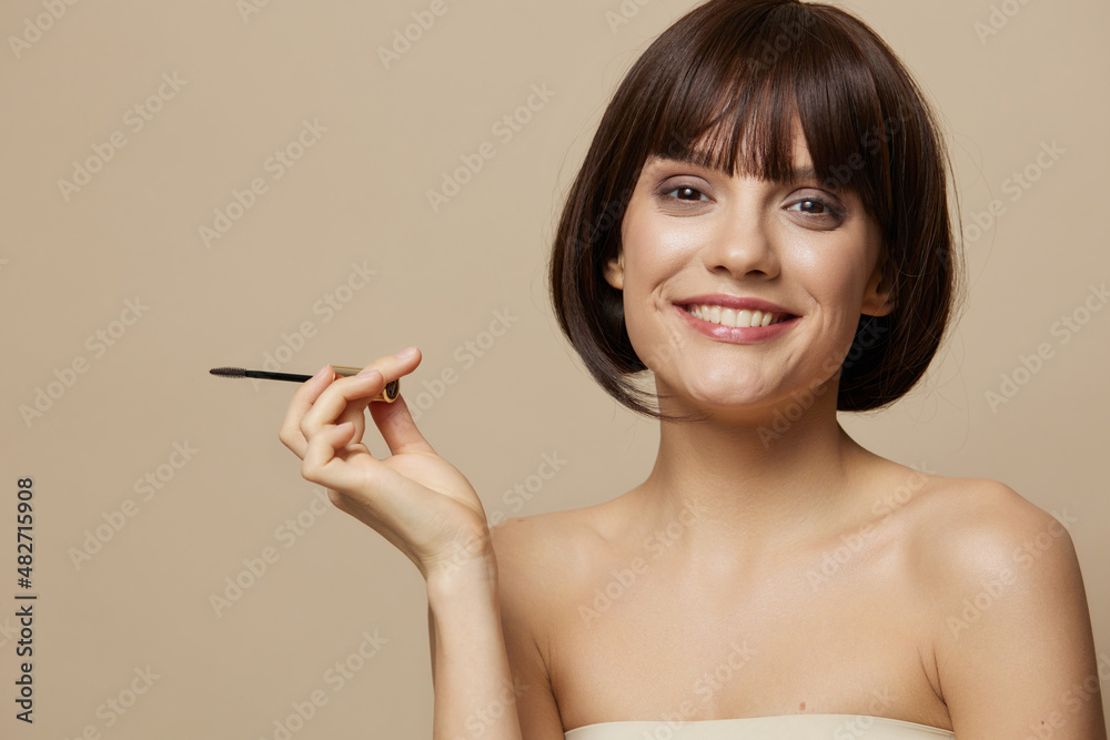 woman eyelash brush model makeup posing isolated background woman eyelash brush model makeup posing isolated background