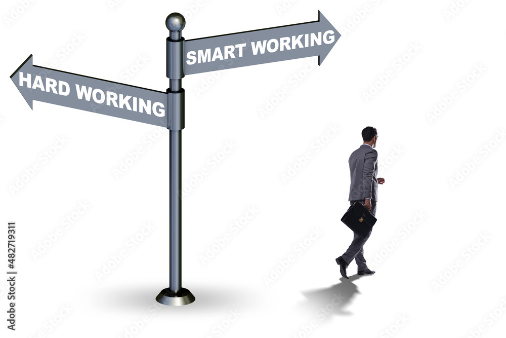 Businessman at the crossroads on working smart or hard