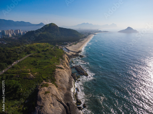 Wallpaper Mural Aerial view of Praia do Secreto near Prainha beach, in Rio de Janeiro, Brazil. Big hills around. Sunny day at dawn. Recreio dos Bandeirantes in the background. Drone Photo Torontodigital.ca