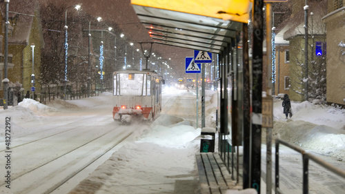 Tramm station with people in Estonia in winter time. no people close up
