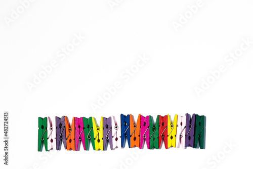 Background, colored clothespins, a number of clothespins