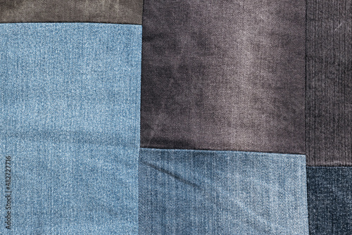 Denim jeans texture, patchwork denim jean fabric pattern.