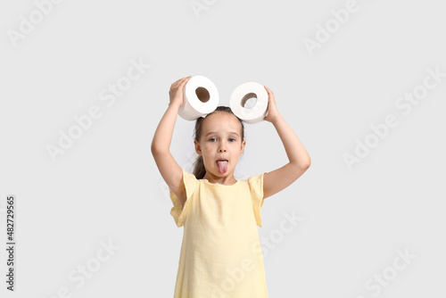 Funny little girl with roll...