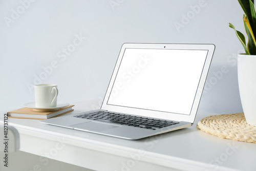 Laptop with blank screen on...