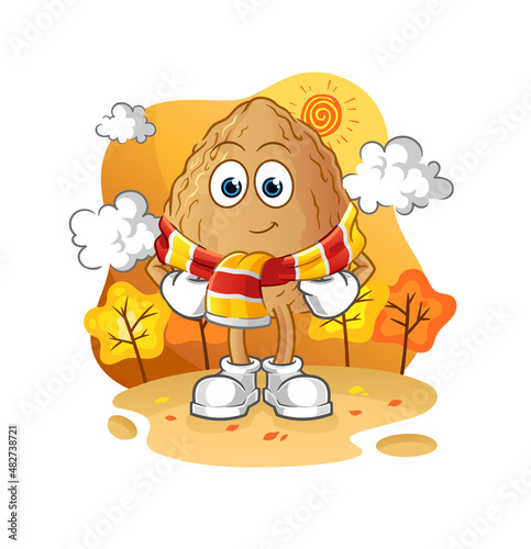 almond in the autumn. cartoon mascot vector