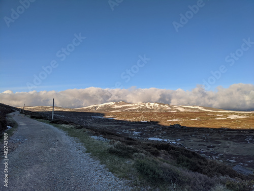 clouds and snow on alpine hiking track