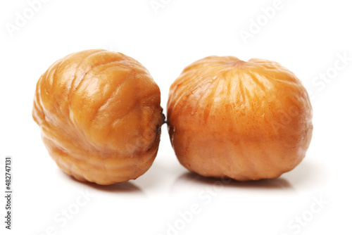 chinese food, peeled roasted chestnut on white background