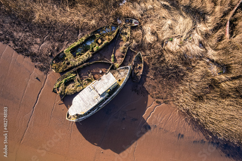 Old Boat Wrecks on the River Exe in Topsham, Devon, England photo