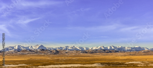 Canadian rockies mountain view from the prairies 2 photo