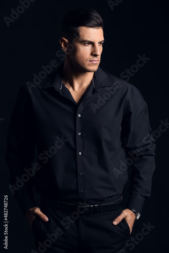 Fashionable gentleman keepi...