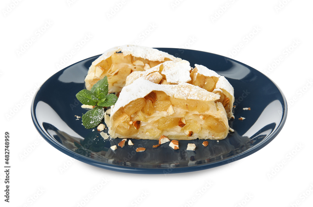 Delicious apple strudel with almonds, powdered sugar and mint on white background Delicious apple strudel with almonds, powdered sugar and mint on white background
