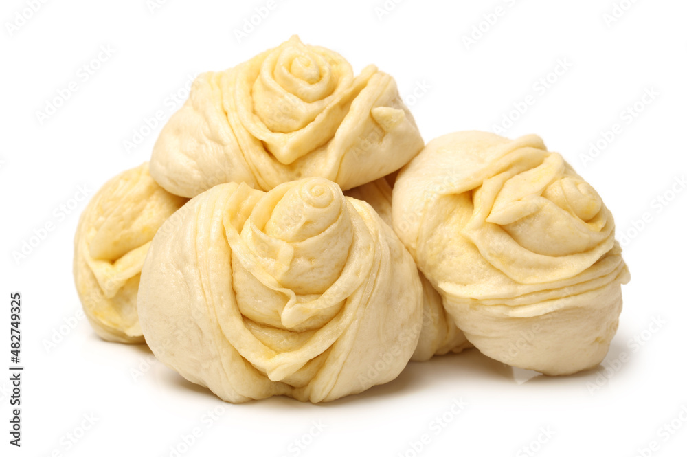Chinese steamed roll. Close up on white background Chinese steamed roll. Close up on white background