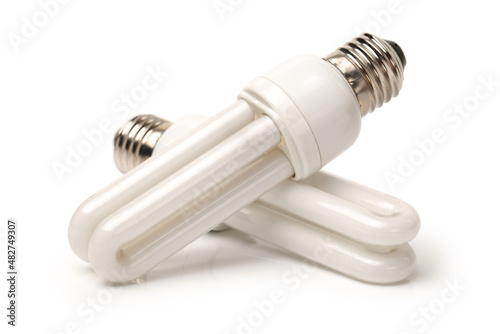 energy saving fluorescent light bulb on white background photo