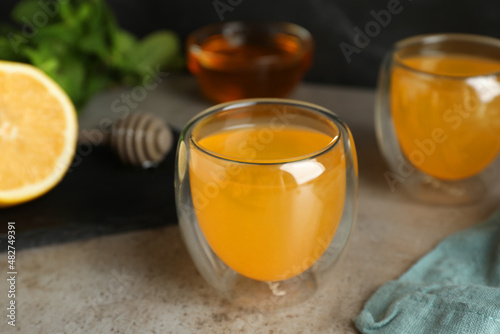 Immunity boosting drink and ingredients on light grey table