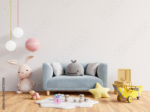Sofa in children's room interior with copy space on wall white color background.