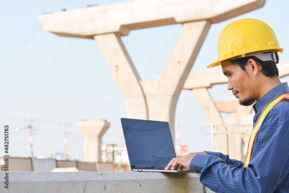 Asian Engineer Construction are Worker employee Worker By safety control helmet on site building Asian Engineer Construction are Worker employee Worker By safety control helmet on site building