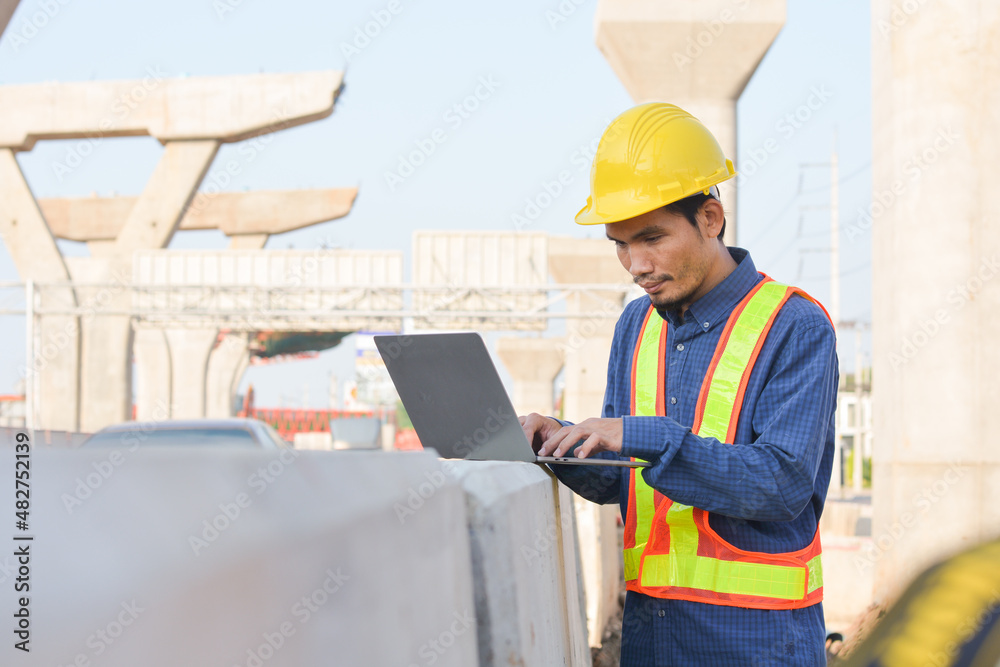 Asian Engineer Construction are Worker employee Worker By safety control helmet on site building,Construction engineering concept, city life and future. Asian Engineer Construction are Worker employee Worker By safety control helmet on site building,Construction engineering concept, city life and future.