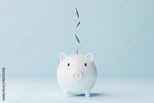 Save money and investment concept. Piggy bank and silver coins falling. 3d rendering illustration