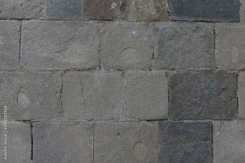 Obraz premium Closeup texture of beautifully made stone wall from 20th century